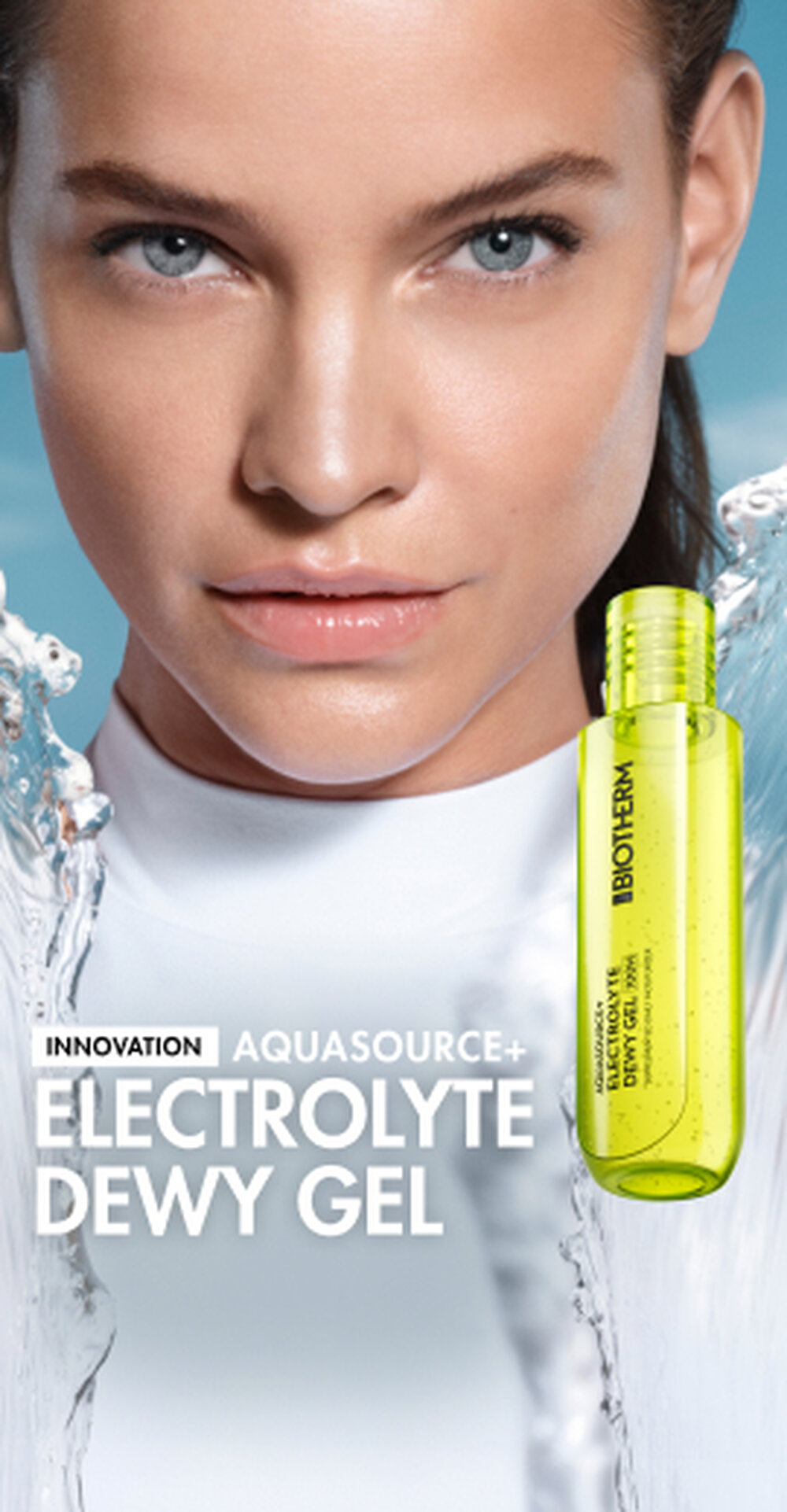 Close-up of a woman with dewy skin beside a bright yellow bottle of Biotherm Aquasource+ Electrolyte Dewy Gel with water splashes.