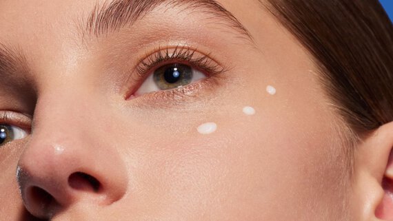 serum texture drots on woman face