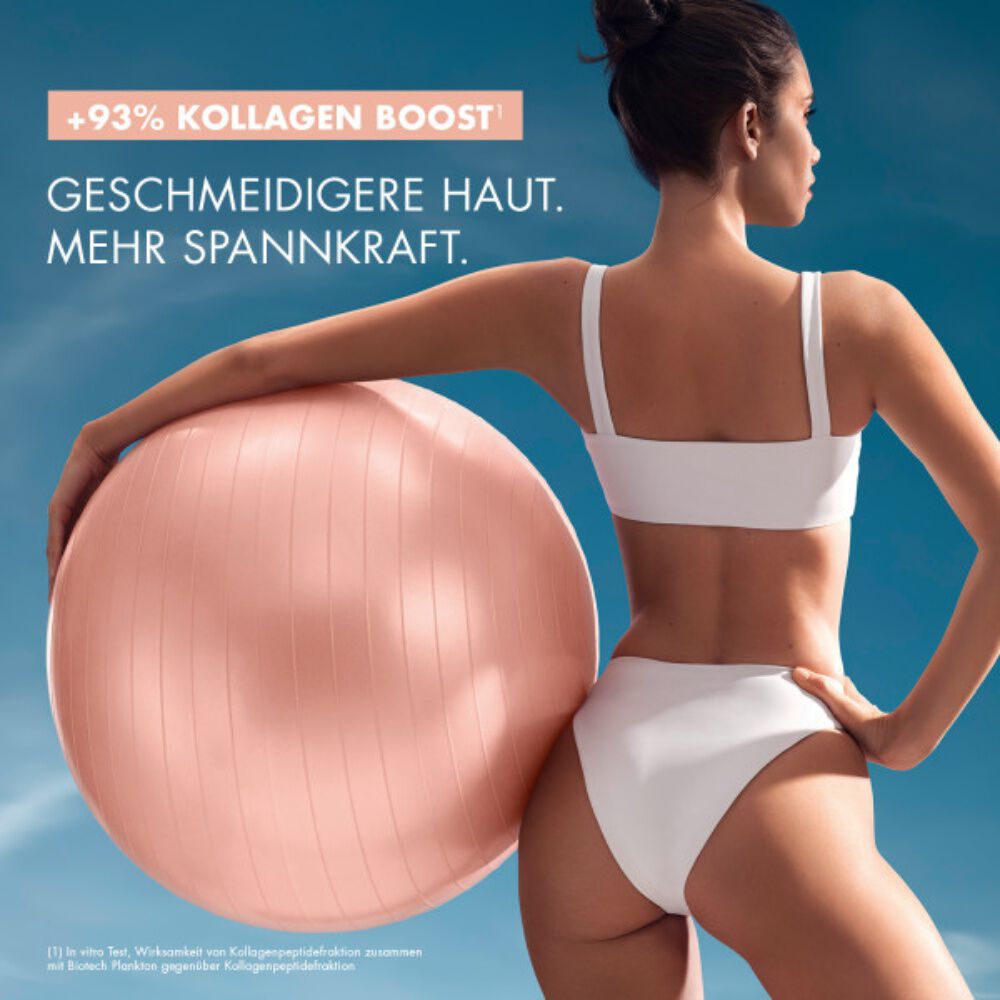 Frau in Badebekleidung halt einen großen, rosa Ball. Text: "GESCHMEIDIGERE HAUT NEUE EFFIZIENZ?".